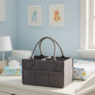 Panier de rangement bébé gris sur tapis