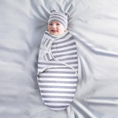 Couverture Emmaillotage bebe sur lit