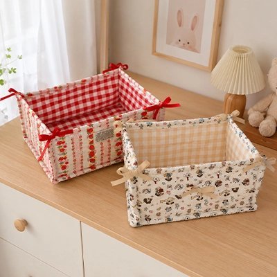Panier rangement bébé deux paniers sur le meuble