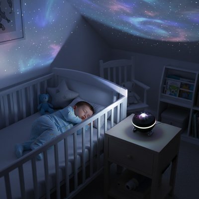 Projecteur enfant dort dans li